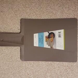Foldable Cutting Board brown new w/ tags, dishwasher safe, 8 x 10 inches